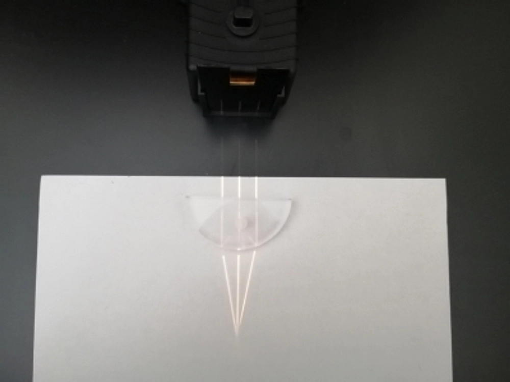 Convex lens merging light rays