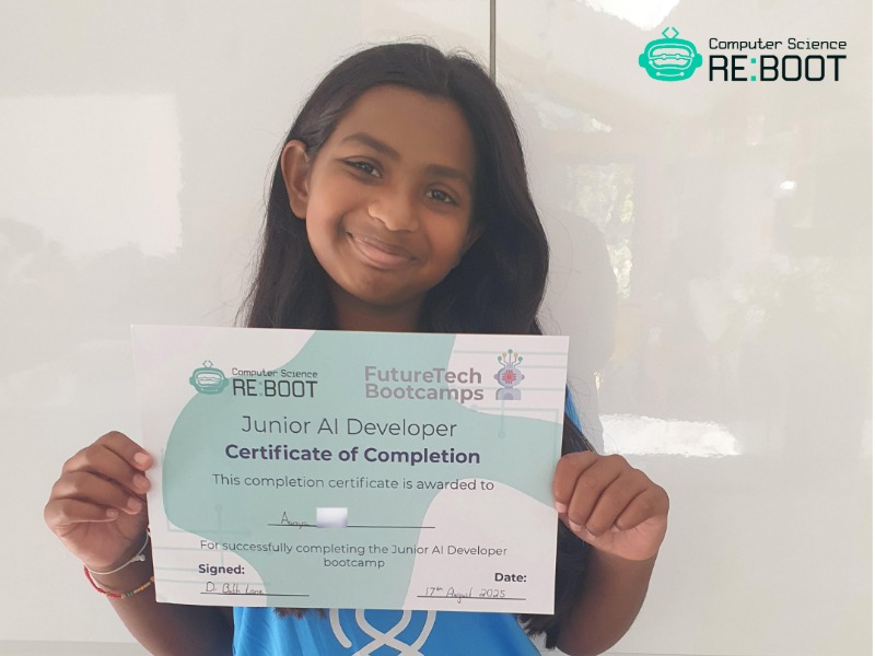 Picture of one of our Junior AI Developer Graduates holding their certificate