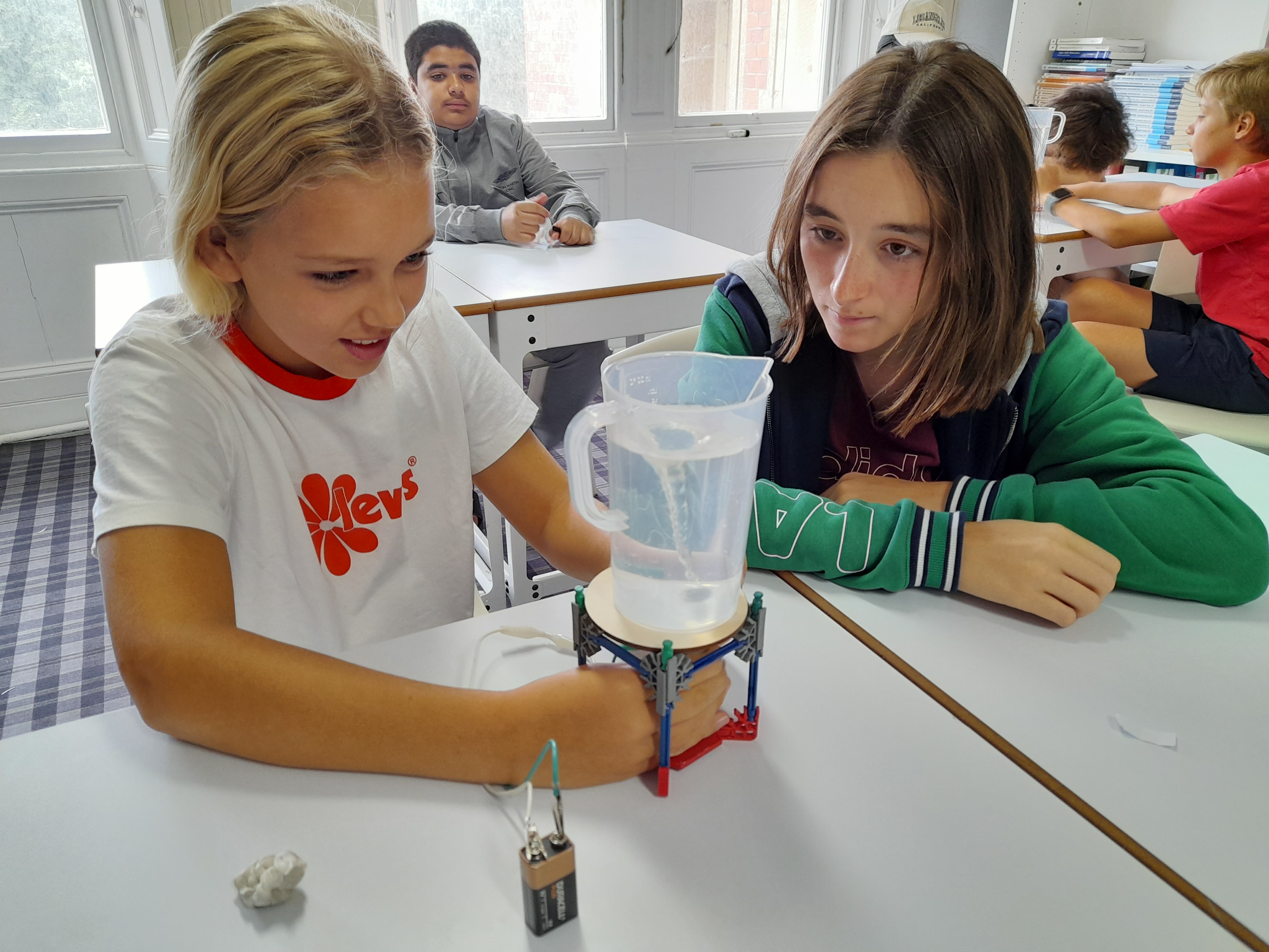Girls Creating Water Tornado