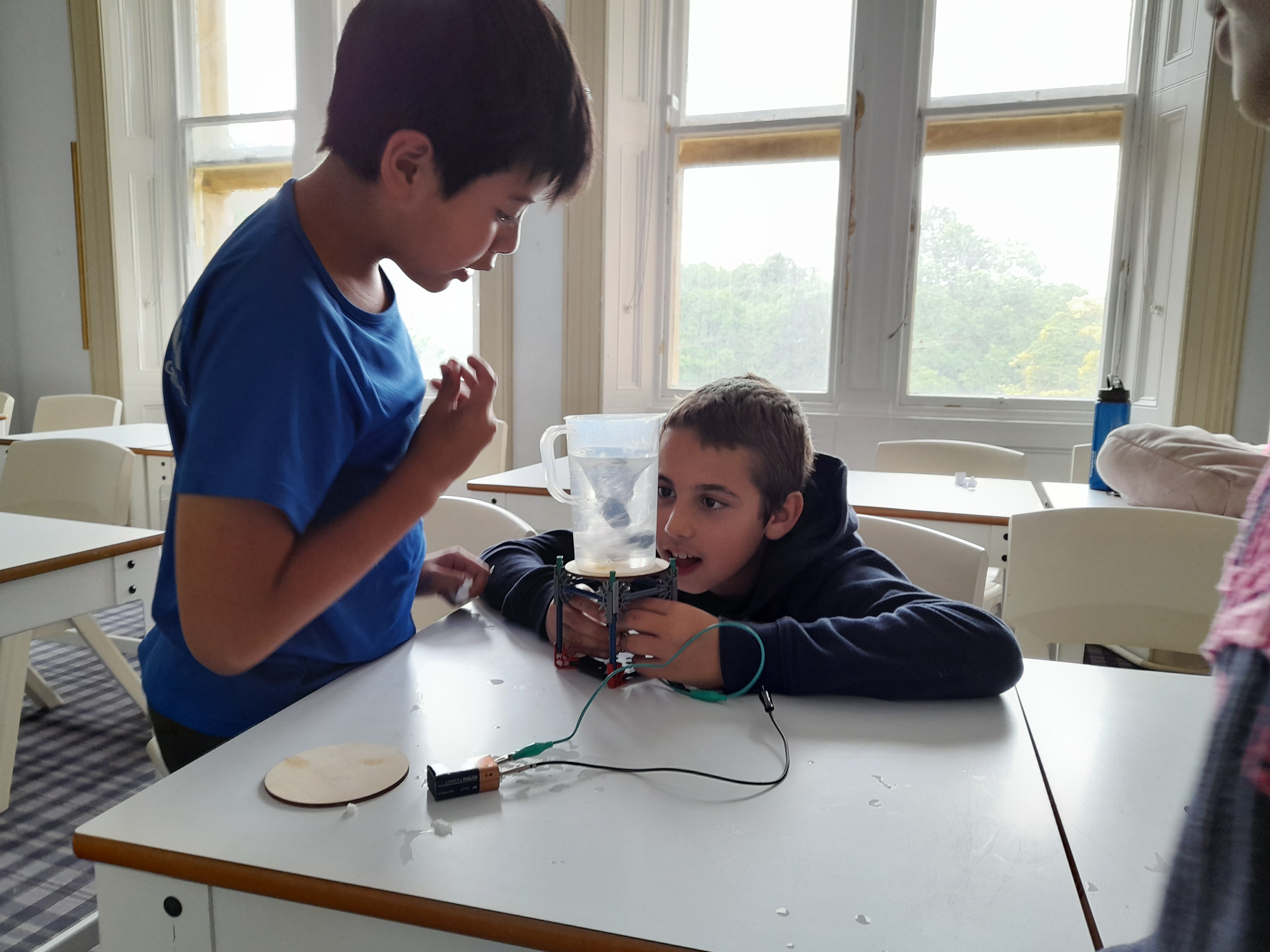 Boys Observing Water Tornado