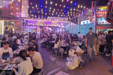 Enjoying Korean BBQ at night