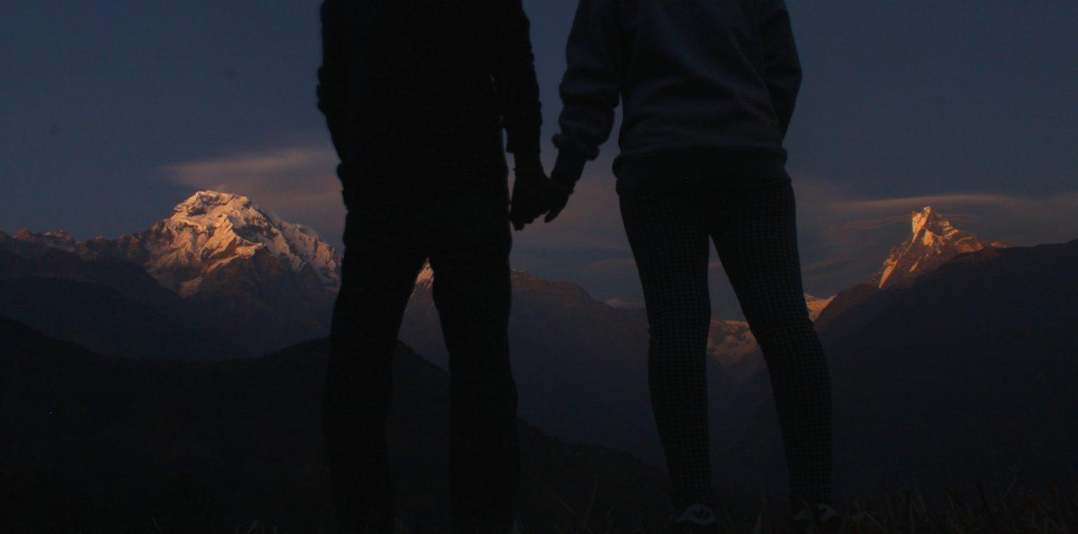 Couple holding hands