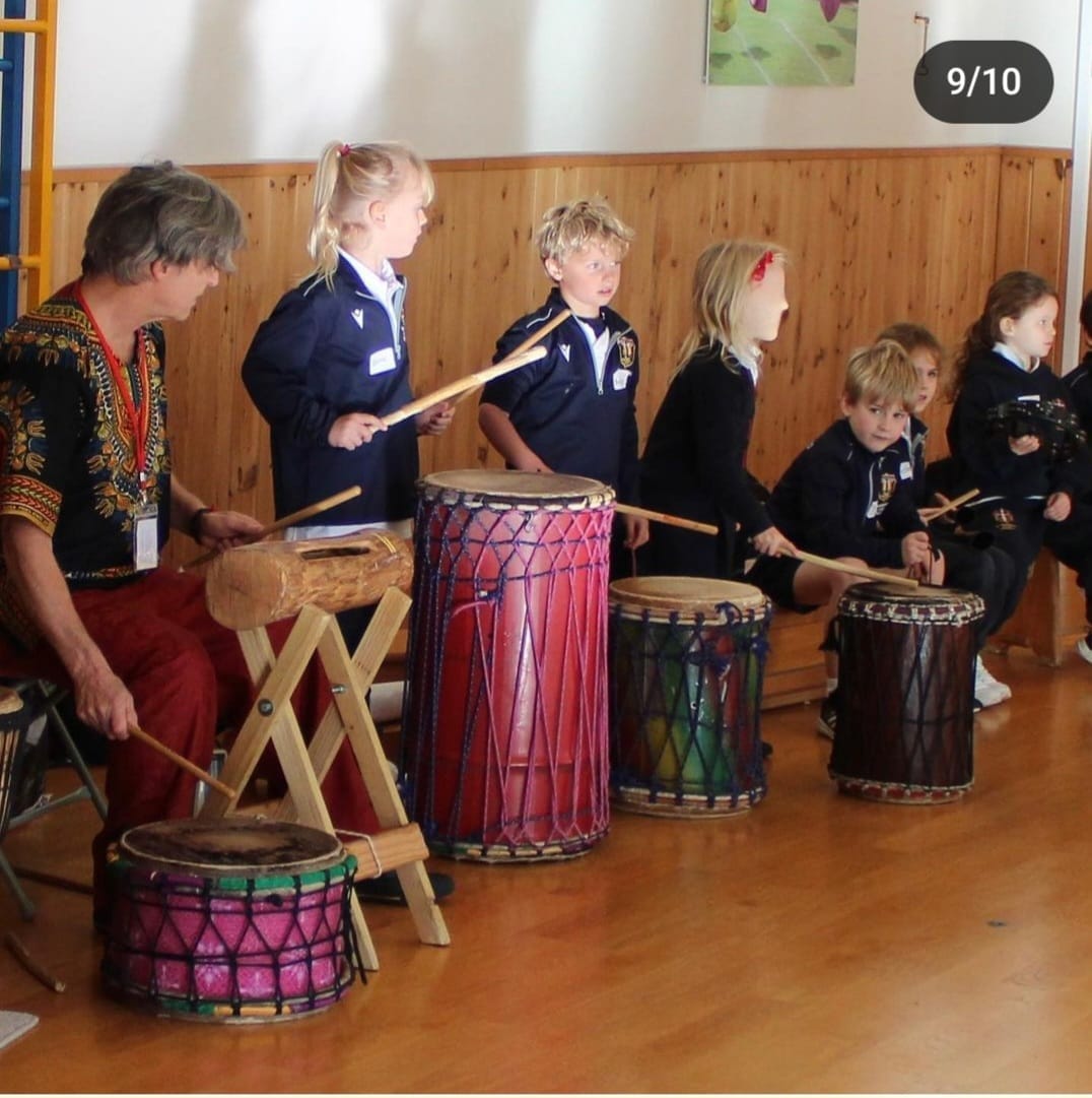 Children enjoying drumming