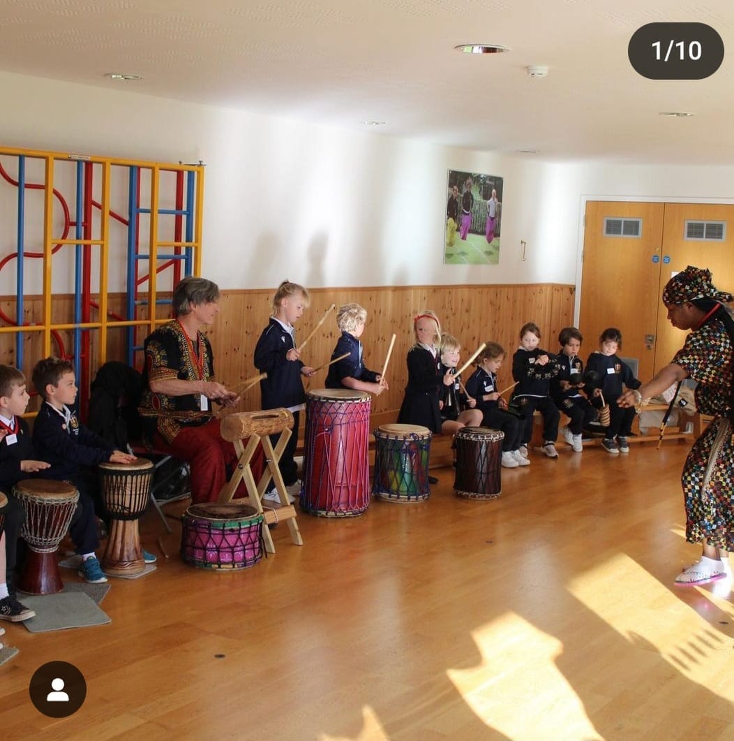 Drumming with children and performing