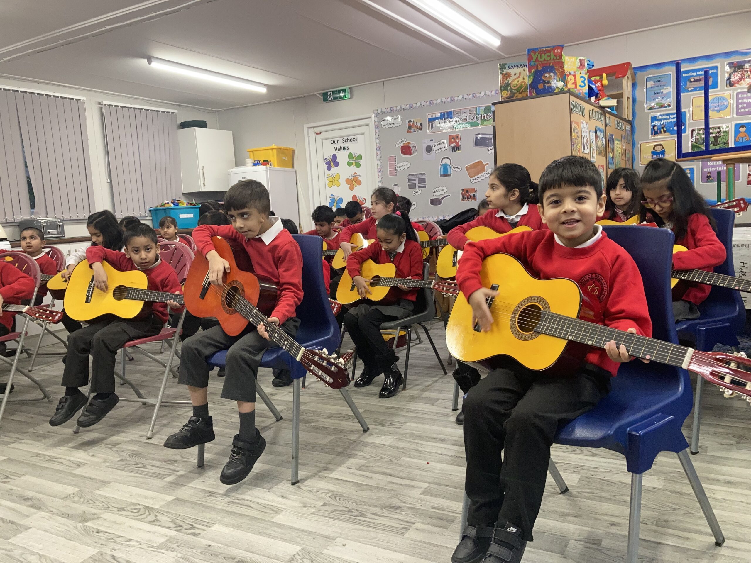 Students enjoying playing guitar