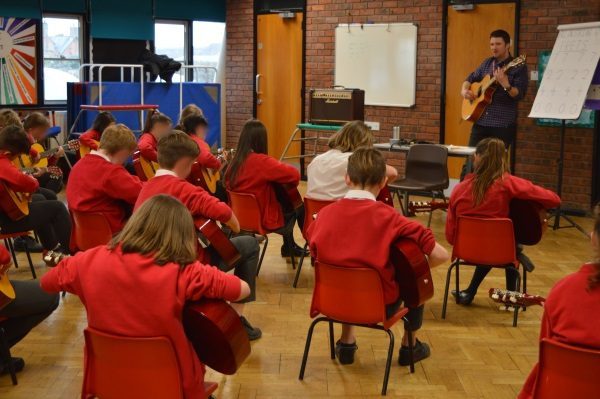 Guitar session in school