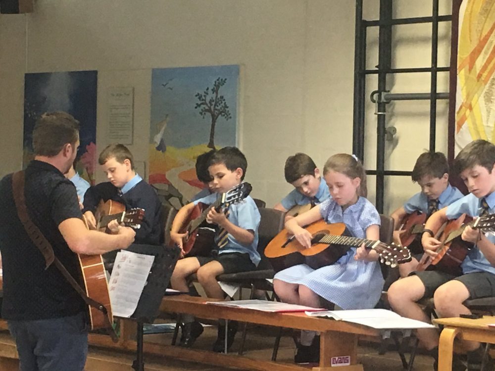 Primary school guitar workshop in school