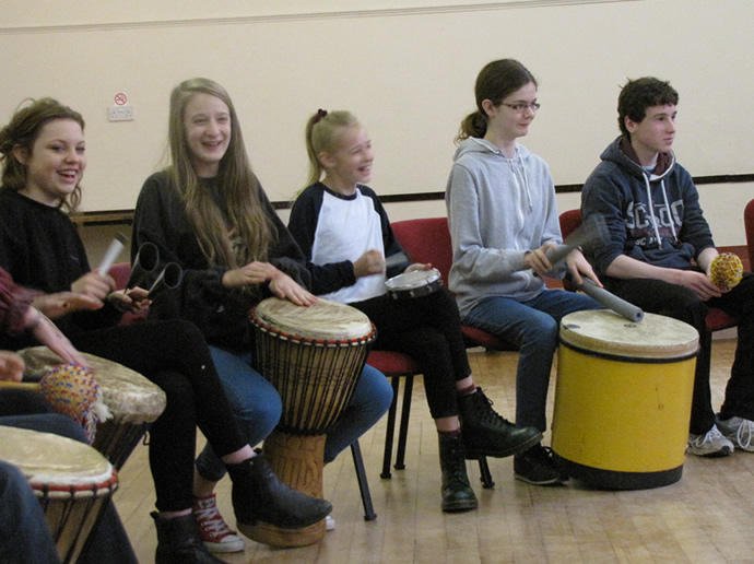 Children playing different instruments